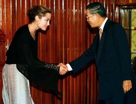Angelina Jolie is greeted by Cambodia's Prime Minister Hun Sen.