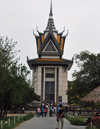 A Buddhist stupa towers over the site and is usually the first stop for visitors passing through Cheoung Ek 